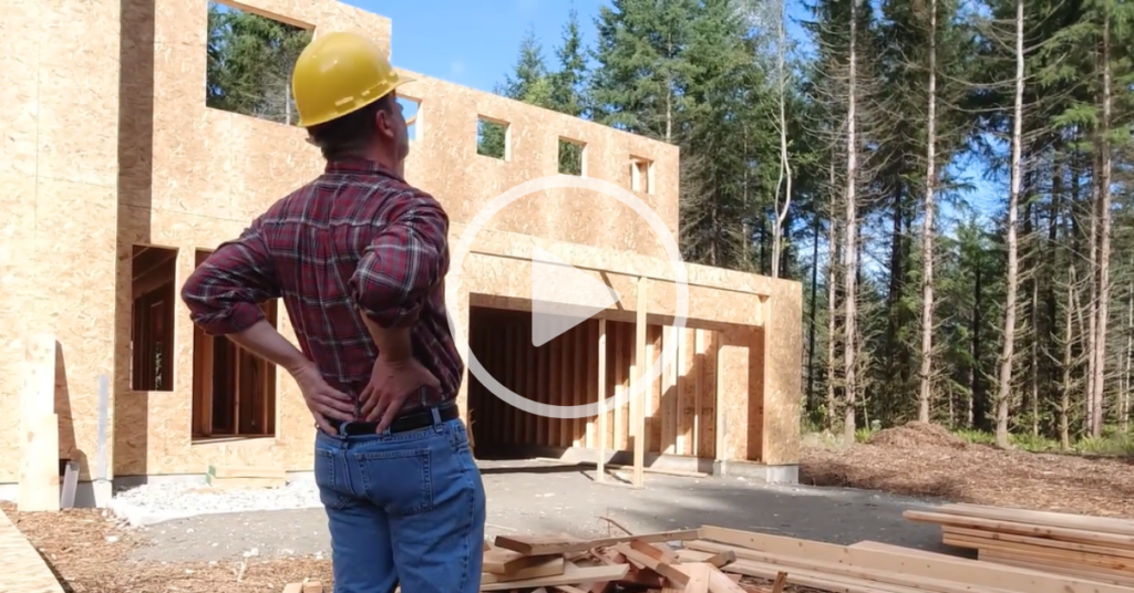 back injury prevention safety video man holding back on construction site