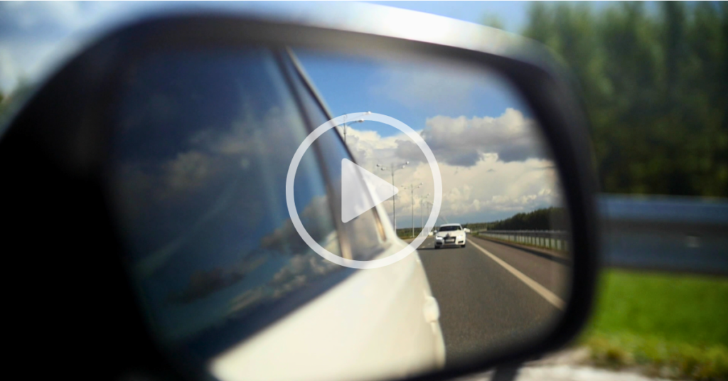 car in side mirror, passing safety