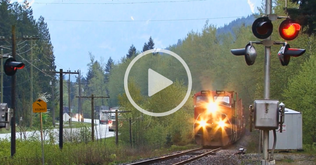 railroad crossing driver safety, train on tracks with headlights